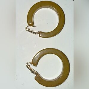Authentic tested Bakelite clip on earrings! Simichrome test photo shown. EUC